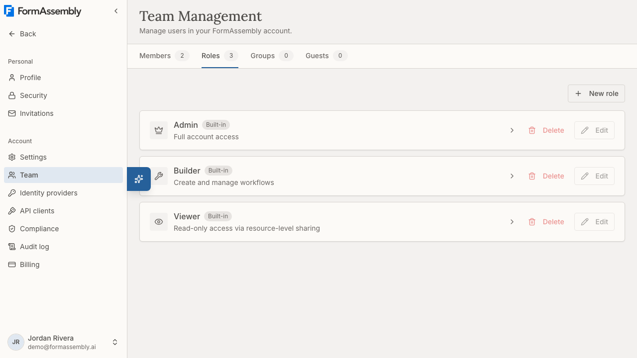 The Roles tab on the Team Management page, showing the Admin, Builder, and Viewer preset roles